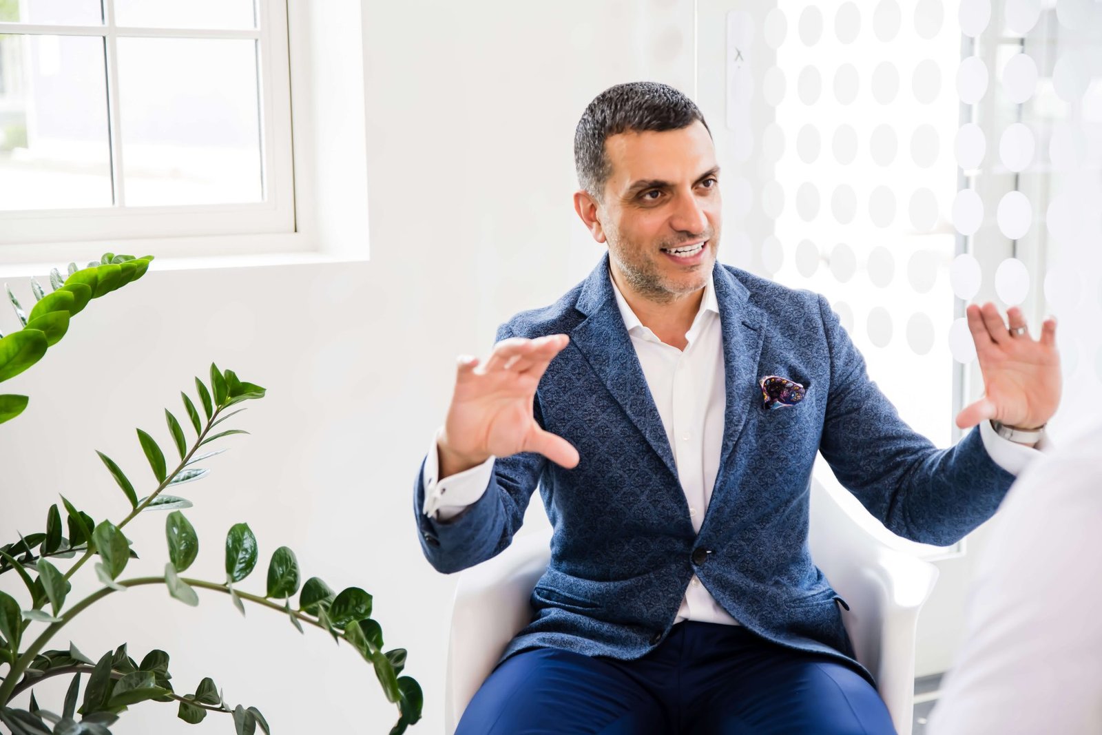 Frustrated staff reviewing schedule during EHR transition in chiropractic clinic